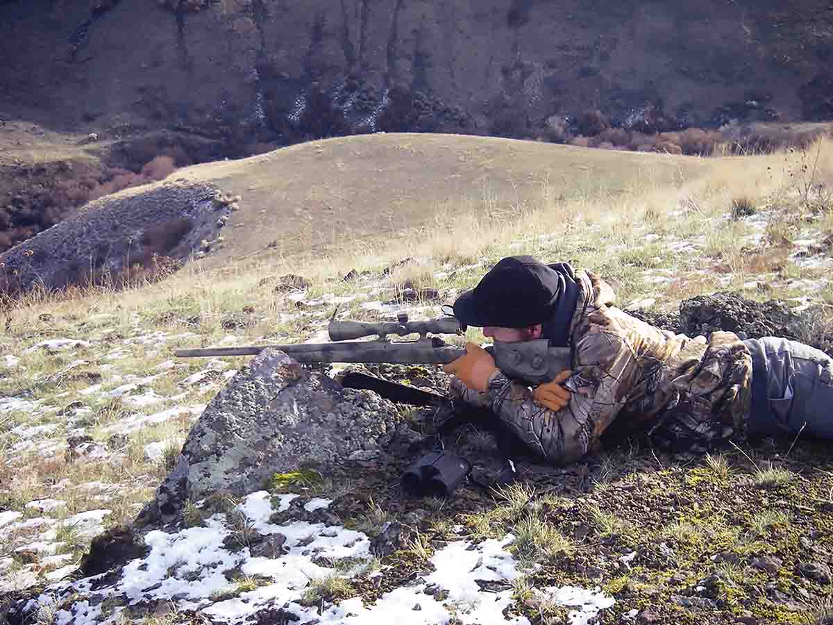 Dialing and holdover aiming methods are both useful in the field. After a busy morning of calling coyotes, Brian’s son, Porter, zeros-in successfully on some tiny 800-yard rocks.